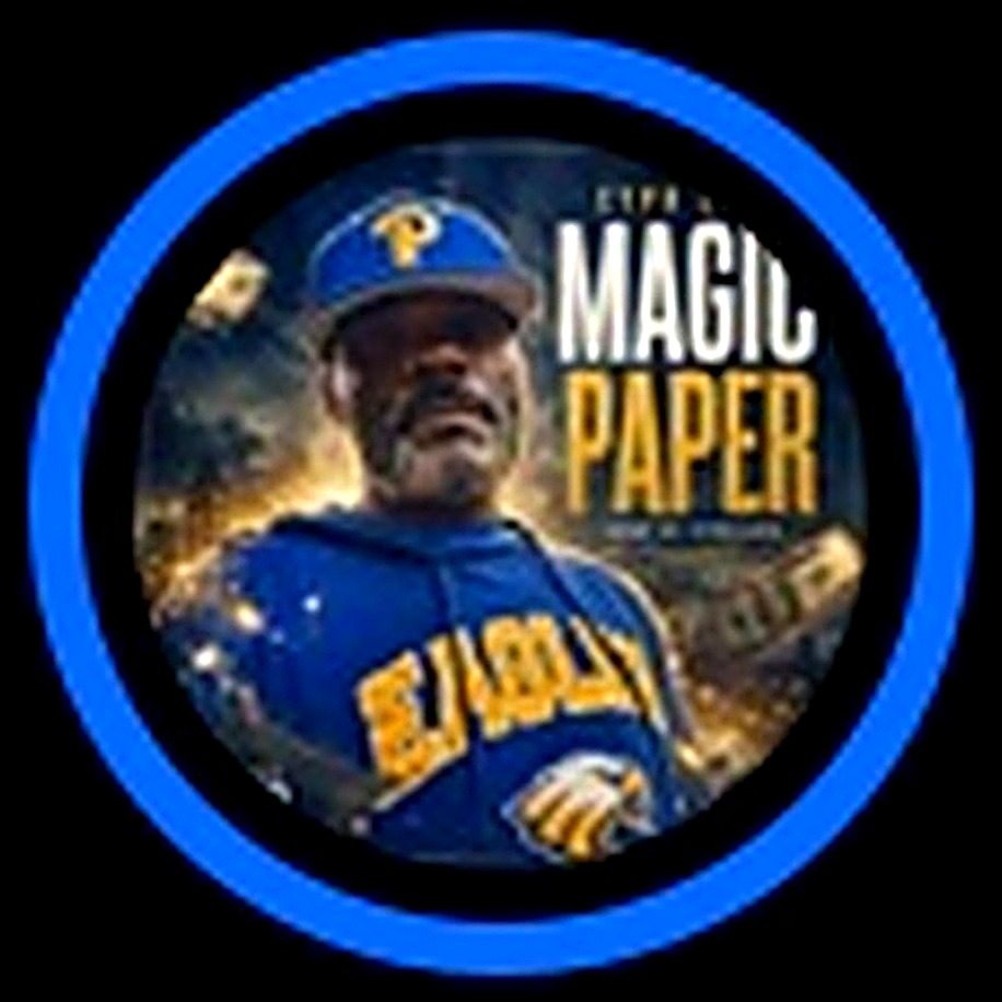 The album cover art — the Magic Paper medallion: Lawrence in blue with gold MAGIC PAPER lettering inside a blue ring, set in a gold frame